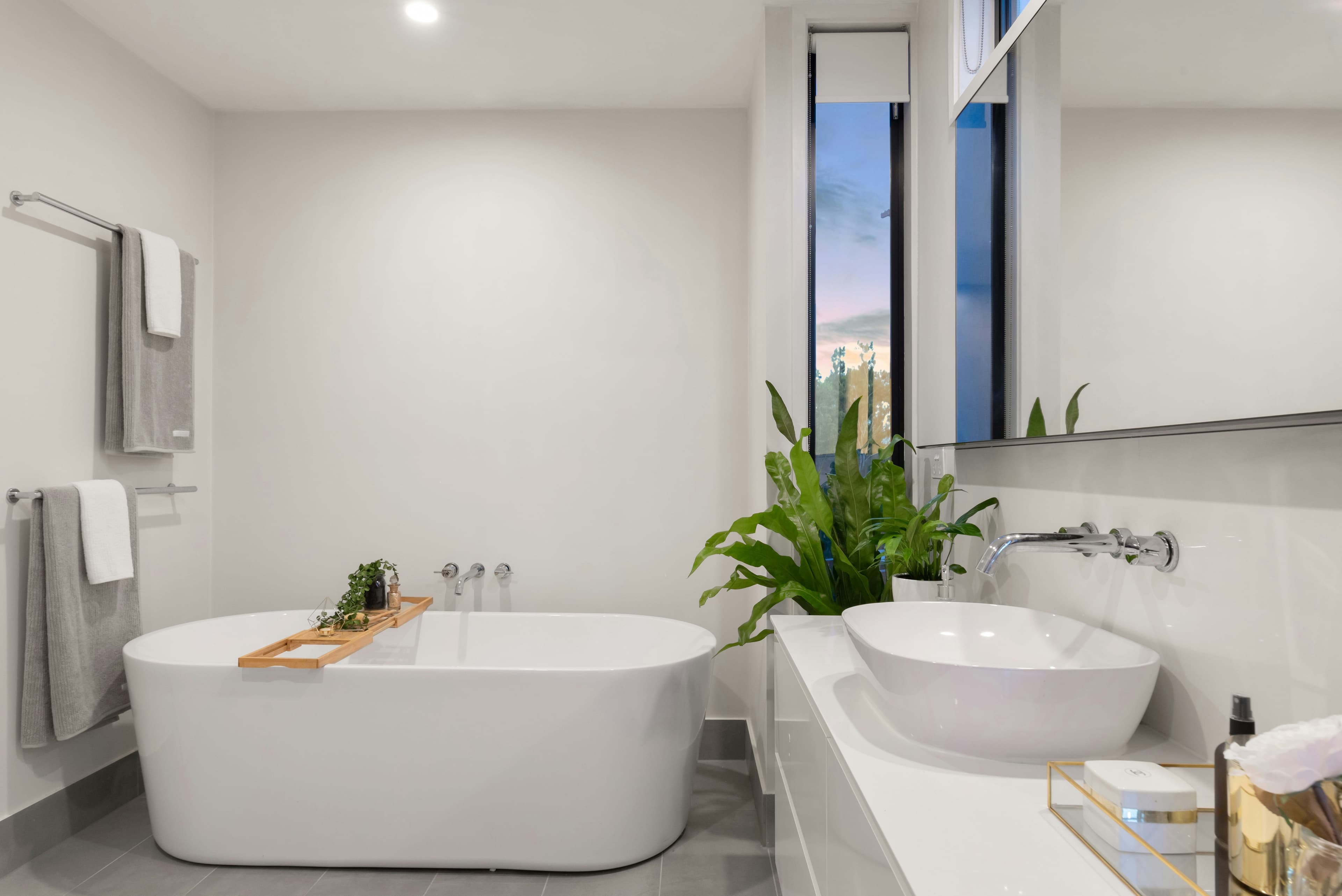 Floor-to-ceiling built-in media wall with integrated TV and hidden storage