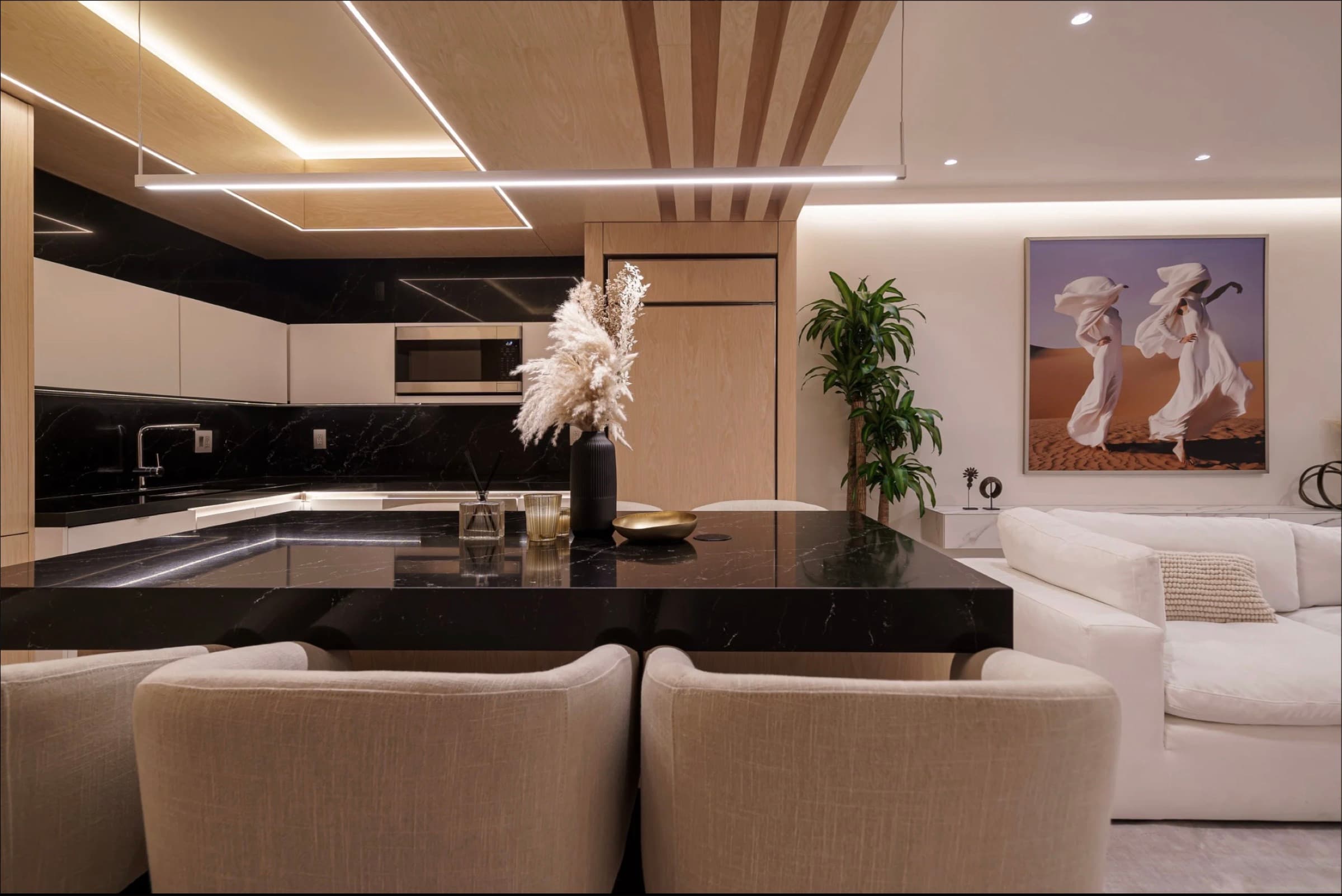 Coral Gables estate kitchen with white oak shaker cabinets and marble countertops